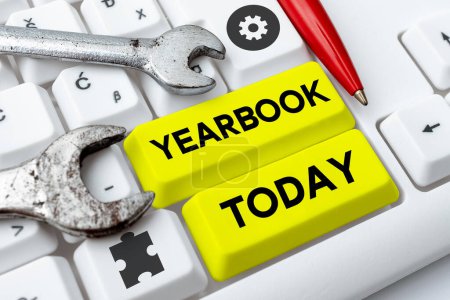 Photo for Writing displaying text Yearbook, Business approach publication compiled by graduating class as a record of the years activities - Royalty Free Image