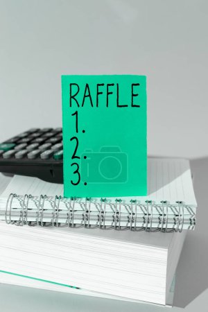 Photo for Text caption presenting Raffle, Business overview means of raising money by selling numbered tickets offer as prize - Royalty Free Image