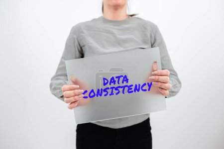 Photo for Hand writing sign Data Consistency, Business overview data values are the same for all instances of application - Royalty Free Image