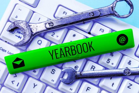 Photo for Handwriting text Yearbook, Internet Concept publication compiled by graduating class as a record of the years activities - Royalty Free Image