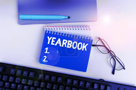 Photo for Text showing inspiration Yearbook, Business idea publication compiled by graduating class as a record of the years activities - Royalty Free Image