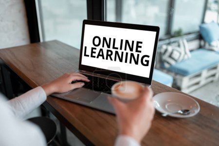 Photo for Text sign showing Online Learning, Concept meaning Larning with the assistance of the Internet and a computer - Royalty Free Image