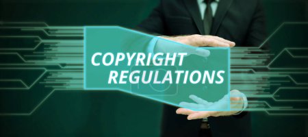 Foto de Redacción que muestra el texto Reglamentos de Copyright, Enfoque de negocio cuerpo de la ley que rige las obras originales de autoría - Imagen libre de derechos