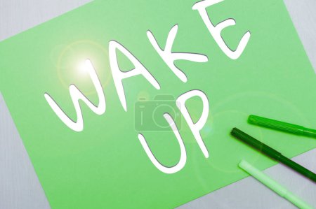 Photo for Writing displaying text Wake Up, Concept meaning an instance of a person waking up or being woken up Rise up - Royalty Free Image