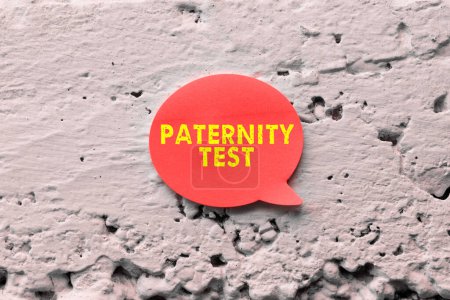 Foto de Signo de texto que muestra la prueba de paternidad, idea de negocio una prueba de ADN para determinar si un hombre determinado es el padre biológico - Imagen libre de derechos