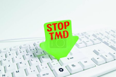 Photo for Text sign showing Stop Tmd, Business showcase Prevent the disorder or problem affecting the chewing muscles - Royalty Free Image