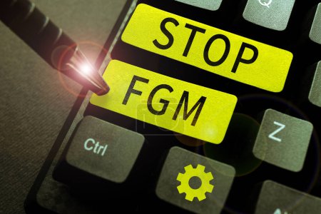 Foto de Señal de escritura a mano Stop Fgm, enfoque empresarial Poner fin al corte genital femenino y la circuncisión femenina - Imagen libre de derechos