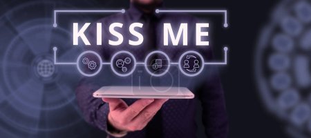 Photo for Text sign showing Kiss Me, Business approach informally request to touch my lips with your lips or press against - Royalty Free Image