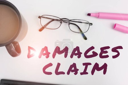 Photo for Text caption presenting Damages Claim, Business showcase Demand Compensation Litigate Insurance File Suit - Royalty Free Image