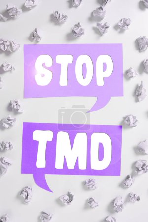 Photo for Text showing inspiration Stop Tmd, Conceptual photo Prevent the disorder or problem affecting the chewing muscles - Royalty Free Image