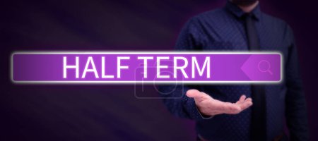 Photo for Text sign showing Half Term, Word Written on half the usual price at which something is offered for sale - Royalty Free Image