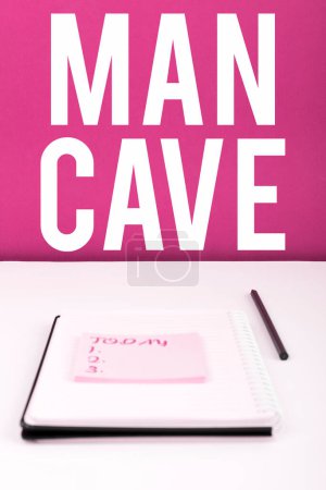 Foto de Texto que presenta Man Cave, Concepto que significa una habitación, espacio o área de una vivienda reservada para una persona masculina - Imagen libre de derechos