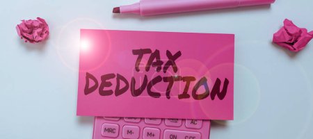 Photo for Text showing inspiration Tax Deduction, Business overview amount subtracted from income before calculating tax owe - Royalty Free Image