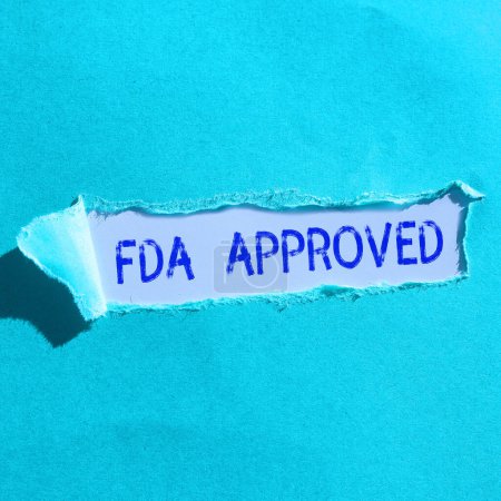 Hand writing sign Fda Approved, Business idea FDA agreed the product or formula is safe and or effective