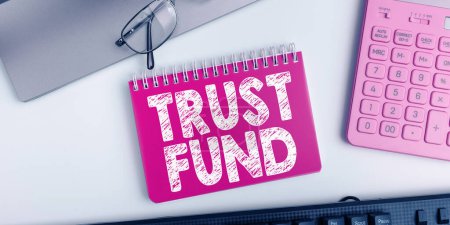 Foto de Hand writing sign Trust Fund, Business approach money that is being held by the trustees for the beneficiaries - Imagen libre de derechos