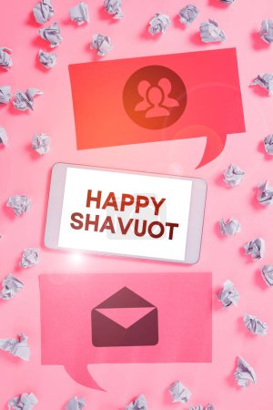 Photo for Sign displaying Happy Shavuot, Word for Jewish holiday commemorating of the revelation of the Ten Commandments - Royalty Free Image