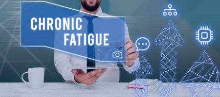 Foto de Text sign showing Chronic Fatigue, Concept meaning A disease or condition that lasts for longer time - Imagen libre de derechos