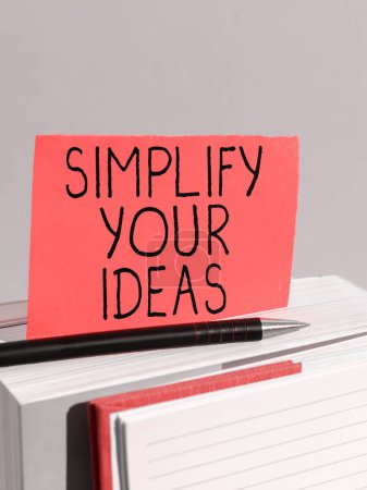 Photo for Text sign showing Simplify Your Ideas, Business showcase make simple or reduce things to basic essentials - Royalty Free Image
