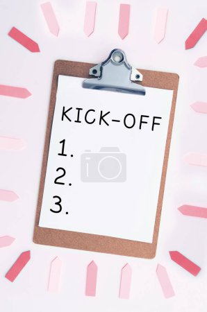 Foto de Hand writing sign Kick Off, Business showcase start or resumption of football match in which player kicks ball - Imagen libre de derechos