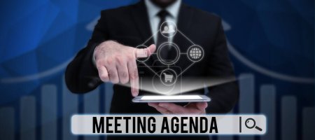 Photo for Hand writing sign Meeting Agenda, Internet Concept An agenda sets clear expectations for what needs to a meeting - Royalty Free Image