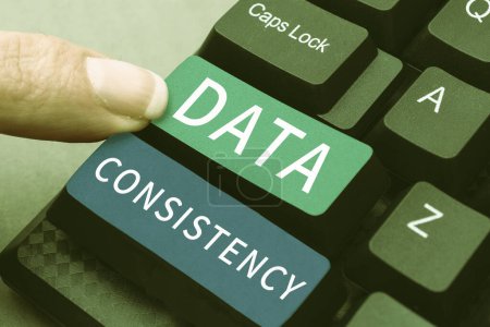 Foto de Sign displaying Data Consistency, Business overview data values are the same for all instances of application - Imagen libre de derechos
