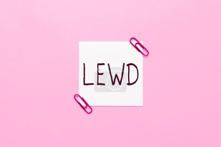 Foto de Escribir mostrando texto Lewd, Concepto de Internet sucio, burdo y ofensivo de una manera sexual - Imagen libre de derechos
