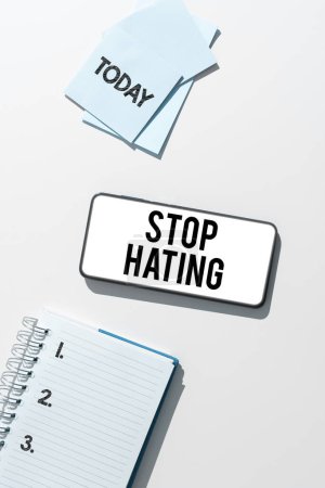 Photo for Text sign showing Stop Hating, Internet Concept cease hostility and aversion deriving from fear, anger, or sense of injury - Royalty Free Image