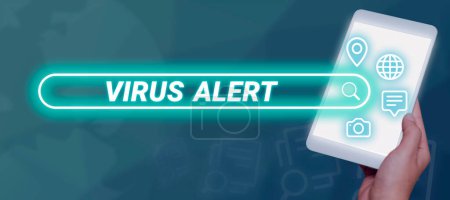 Téléchargez les photos : Sign displaying Virus Alert, Word Written on message warning of a non-existent computer virus threat - en image libre de droit