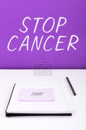 Photo pour Inspiration montrant le signe Stop Cancer, Parole écrite sur la pratique de prendre des mesures actives pour réduire le taux de cancer - image libre de droit