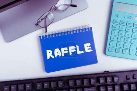 Photo for Inspiration showing sign Raffle, Conceptual photo means of raising money by selling numbered tickets offer as prize - Royalty Free Image