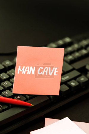 Foto de Conceptual display Man Cave, Word for a room, space or area of a dwelling reserved for a male person - Imagen libre de derechos