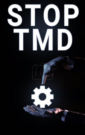 Photo for Hand writing sign Stop Tmd, Word Written on Prevent the disorder or problem affecting the chewing muscles - Royalty Free Image