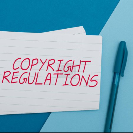 Foto de Writing displaying text Copyright Regulations, Concept meaning body of law that governs the original works of authorship - Imagen libre de derechos