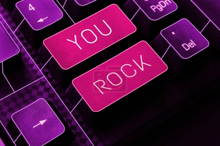 Foto de Conceptual display You Rock, Word Written on slang phrase of praise or encouragement conveying you are awesome - Imagen libre de derechos