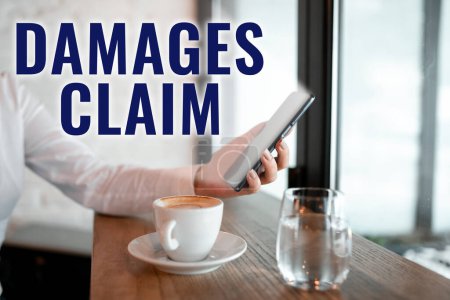 Photo for Text sign showing Damages Claim, Business showcase Demand Compensation Litigate Insurance File Suit - Royalty Free Image