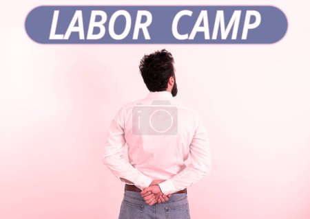 Photo for Hand writing sign Labor Camp, Business showcase a penal colony where forced labor is performed - Royalty Free Image