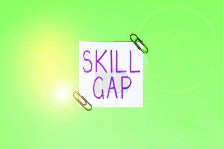 Photo for Text showing inspiration Skill Gap, Business showcase Refering to a persons weakness or limitation of knowlege - Royalty Free Image
