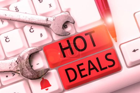 Photo for Sign displaying Hot Deals, Word for An agreement through which one of the paties is offered and accept - Royalty Free Image