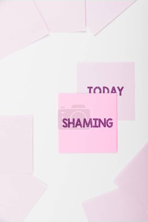Photo for Writing displaying text Shaming, Conceptual photo subjecting someone to disgrace, humiliation, or disrepute by public exposure - Royalty Free Image