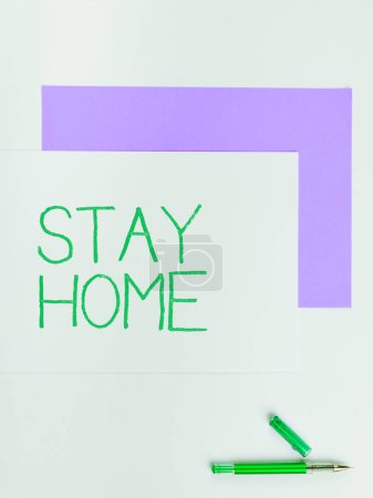 Foto de Writing displaying text Stay Home, Word Written on not go out for an activity and stay inside the house or home - Imagen libre de derechos