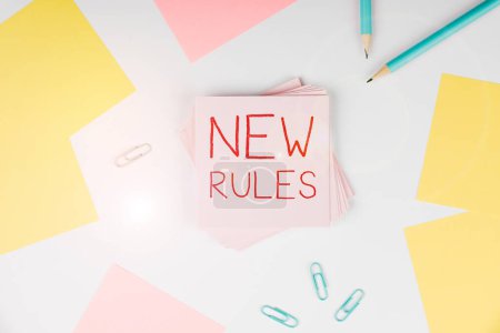 Téléchargez les photos : Text caption presenting New Rules, Internet Concept A state of changing an iplemented policy for better upgrade - en image libre de droit