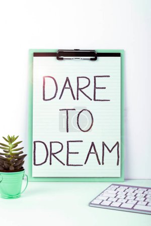 Téléchargez les photos : Inspiration showing sign Dare To Dream, Business approach Do not be afraid of have great ambitions goals objectives - en image libre de droit