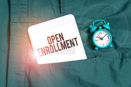 Photo for Text sign showing Open Enrollment, Concept meaning The yearly period when people can enroll an insurance - Royalty Free Image