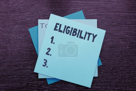 Photo for Handwriting text Eligibility, Word for State of having the right for doing or obtain something Proper - Royalty Free Image