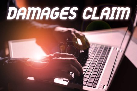 Téléchargez les photos : Sign displaying Damages Claim, Business overview Demand Compensation Litigate Insurance File Suit - en image libre de droit
