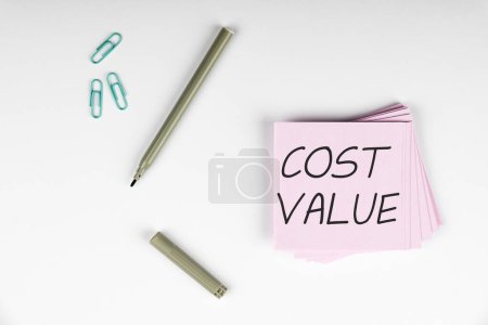 Photo for Handwriting text Cost Value, Concept meaning The amount that usualy paid for a item you buy or hiring a person - Royalty Free Image