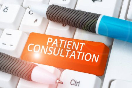 Foto de Text sign showing Patient Consultation, Business idea doctors discuss a patient and his or her condition - Imagen libre de derechos