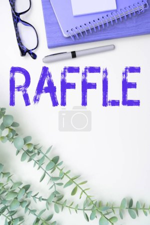 Photo for Writing displaying text Raffle, Business concept means of raising money by selling numbered tickets offer as prize - Royalty Free Image