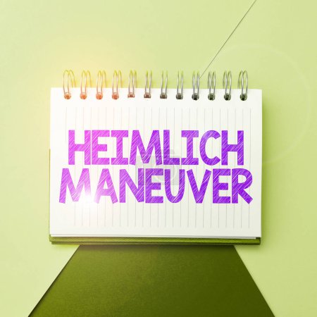 Foto de Text caption presenting Heimlich Maneuver, Internet Concept application of upward pressure in case of choking - Imagen libre de derechos