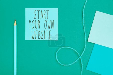 Foto de Hand writing sign Start Your Own Website, Internet Concept serve as Extension of a Business Card a Personal Site - Imagen libre de derechos